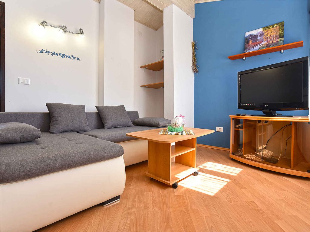 Ferienwohnung mit Garten und Klimaanlage