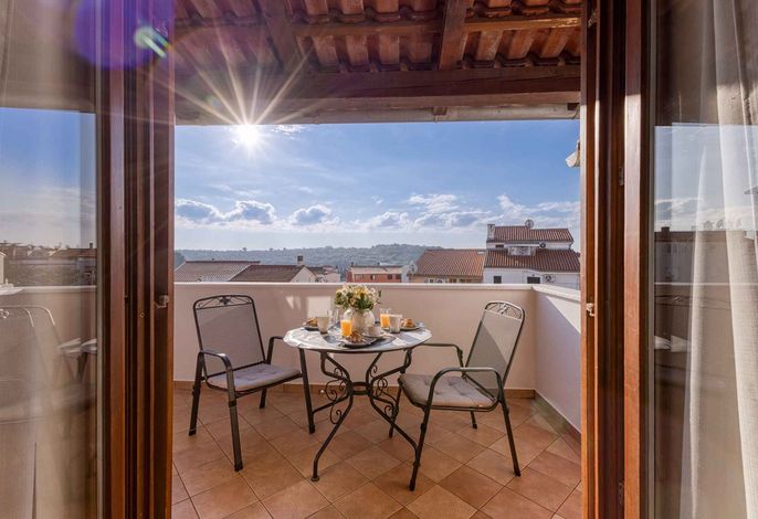 Ferienwohnung mit Klimaanlage und Balkon