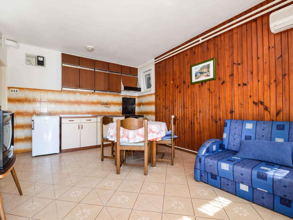 Ferienwohnung mit Terrasse und Klimaanage