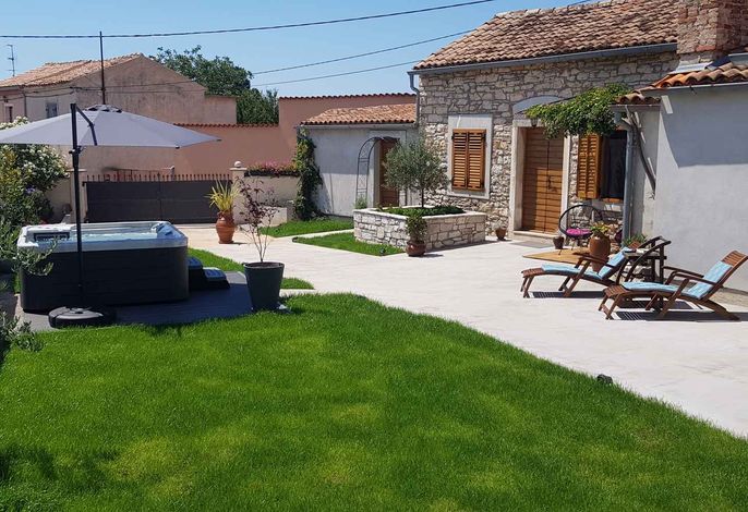 Ferienwohnung mit Garten und Whirlpool zur gemeinsamen Nutzung