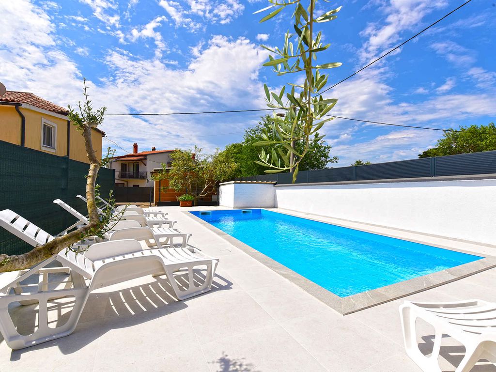 Ferienhaus mit Terrasse und Klimaanlage