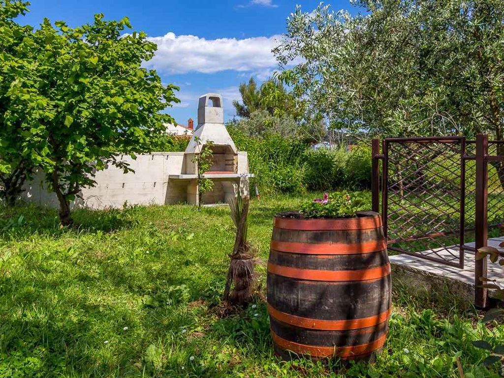Ferienhaus mit Klimaanlage und Garten