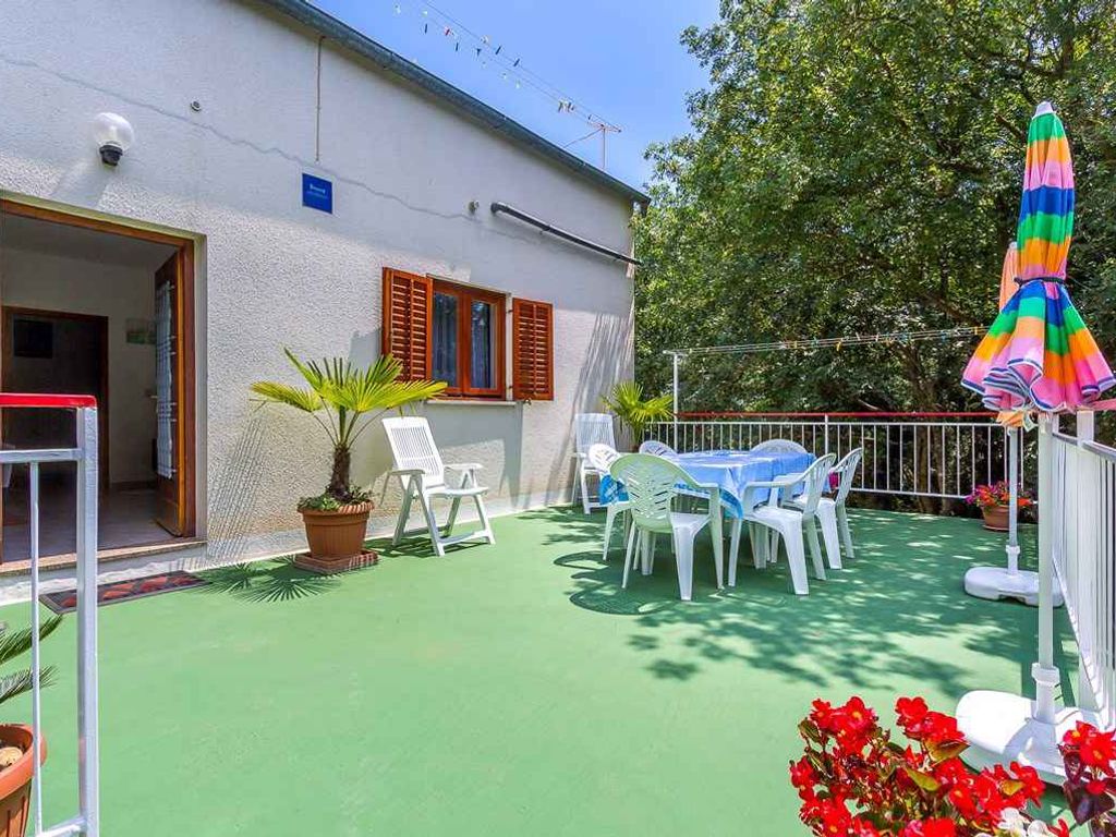 Ferienhaus mit Garten, Grill und Kinderspielplatz