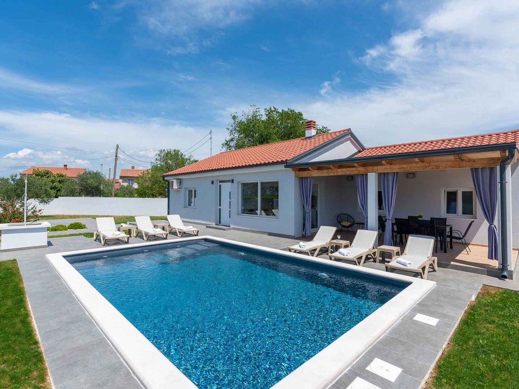 Ferienhaus mit Privatpool