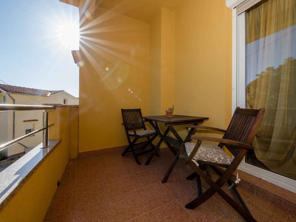 Ferienwohnung mit Klimaanlage und Balkon