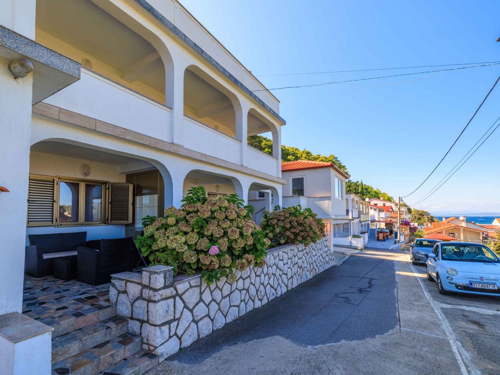 Ferienwohnung mit Klimaanlage, Terrasse und Meerblick in Lopar
