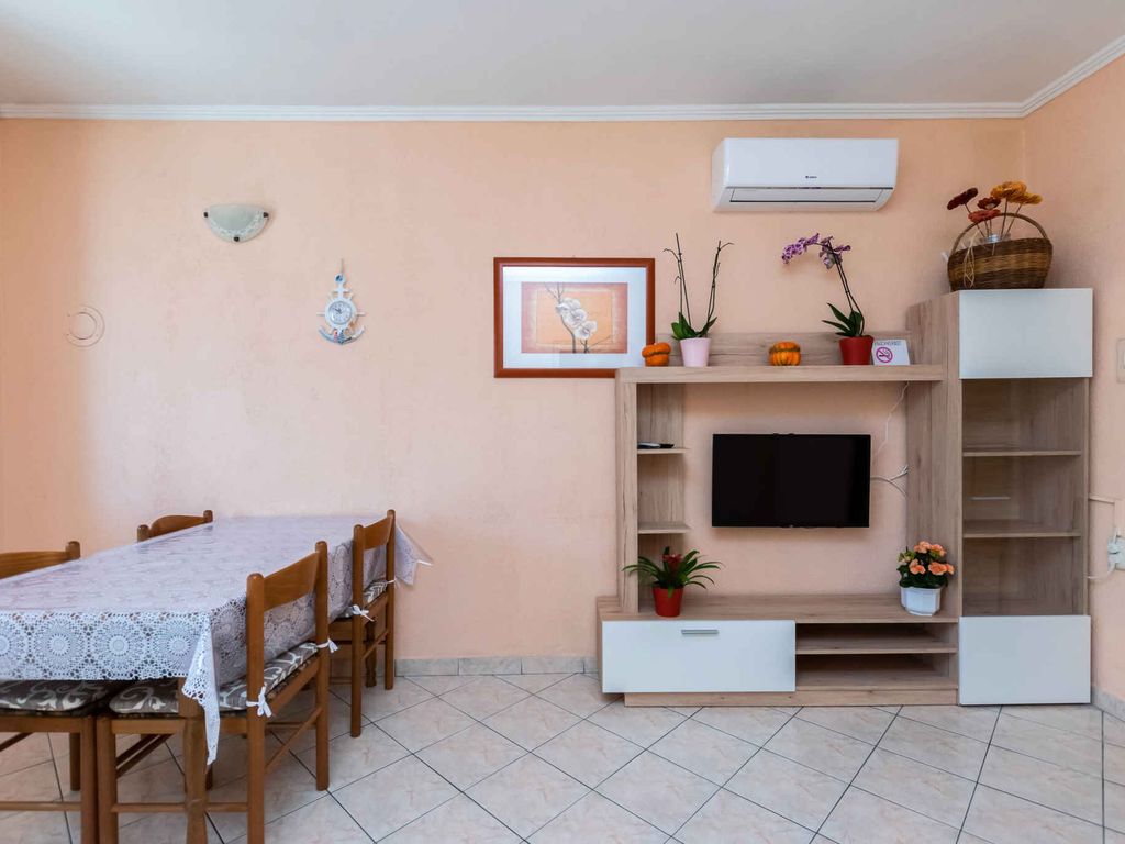 Ferienhaus mit Klimaanlage und Grill