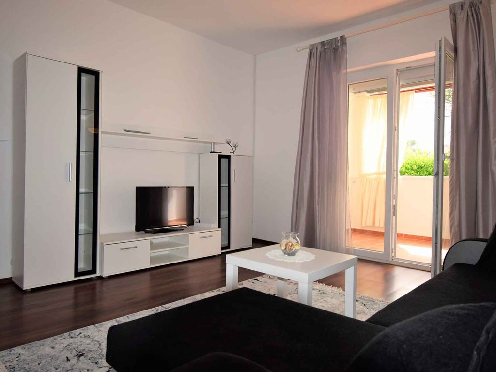 Ferienwohnung mit Balkon, Garten und Grill