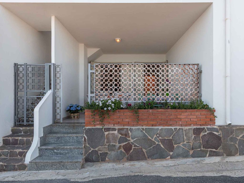 Ferienhaus mit Terrasse direkt am Meer