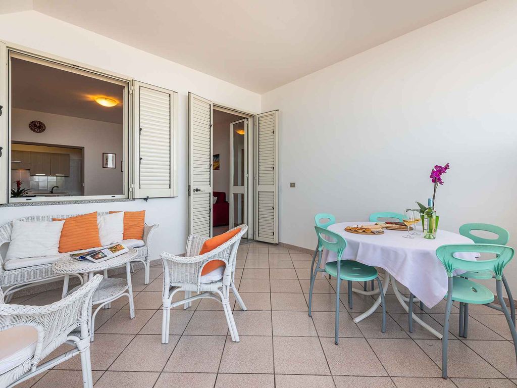 Ferienhaus mit Terrasse direkt am Meer