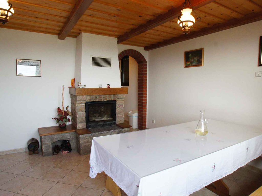 Ferienhaus mit Blakon und Garten