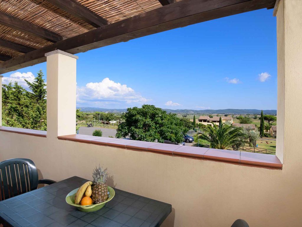 Ferienwohnung in einer Residenz mit Pool und Grünanlage