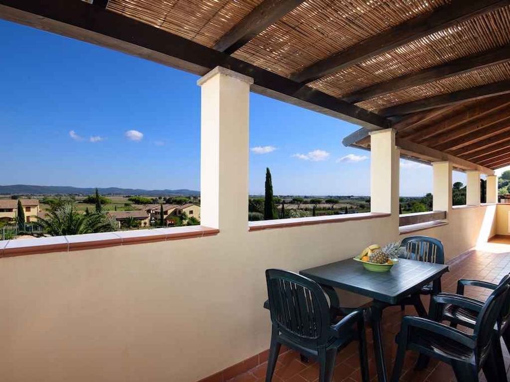 Ferienwohnung in einer Residenz mit Pool und Grünanlage
