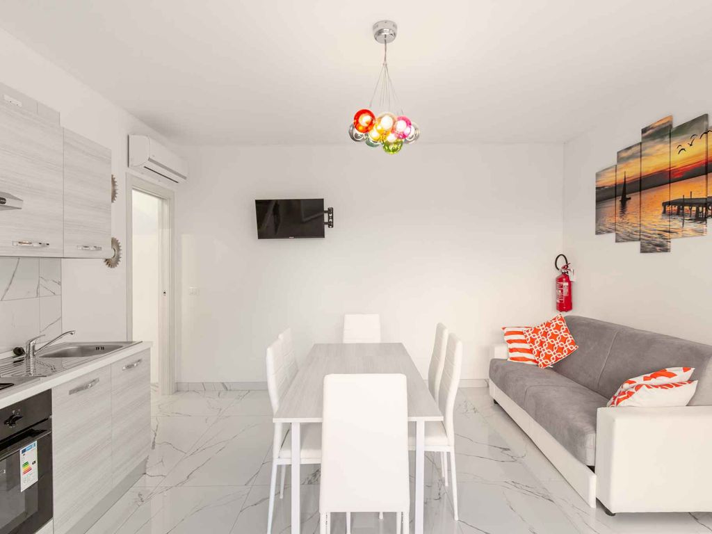 Ferienwohnung mit Klimaanlage, Gemeinschaftsgarten und Pool