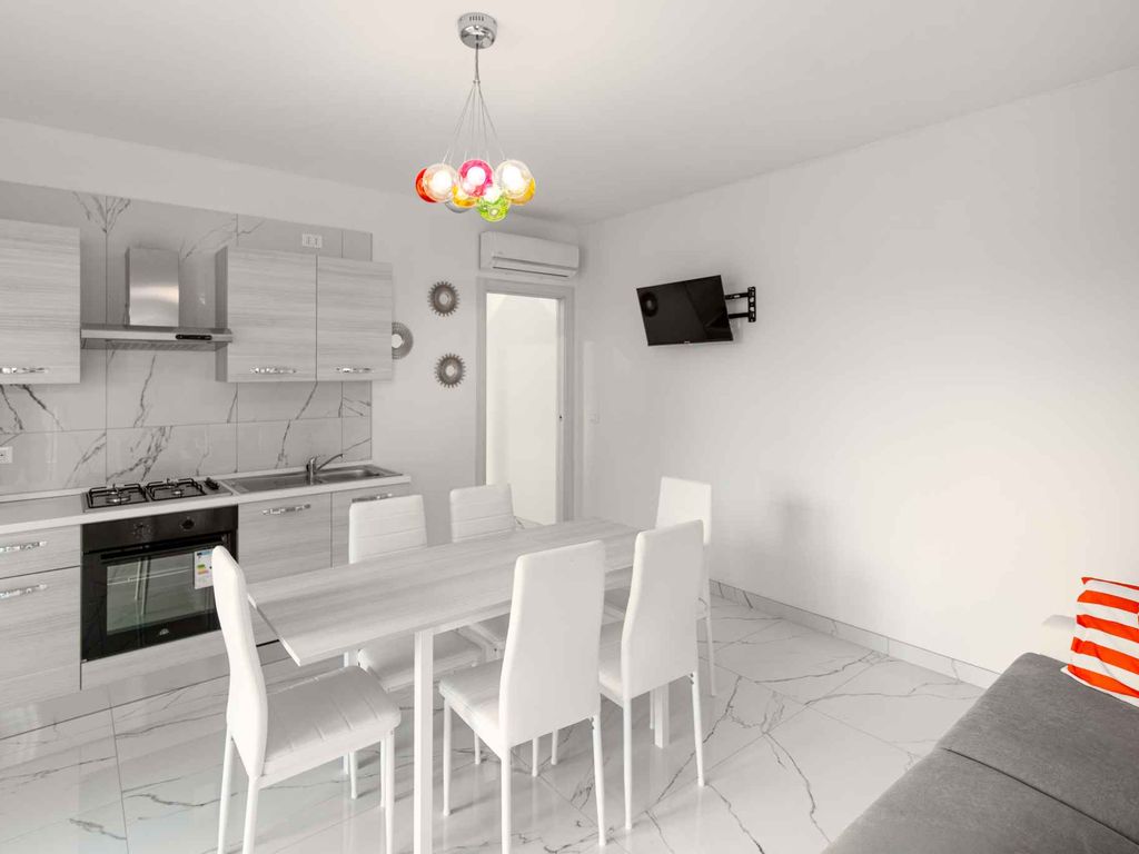 Ferienwohnung mit Klimaanlage, Gemeinschaftsgarten und Pool