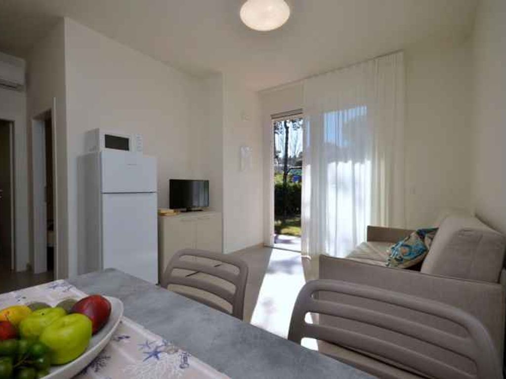 Ferienwohnung mit Klimaanlage, Terrasse und Garten