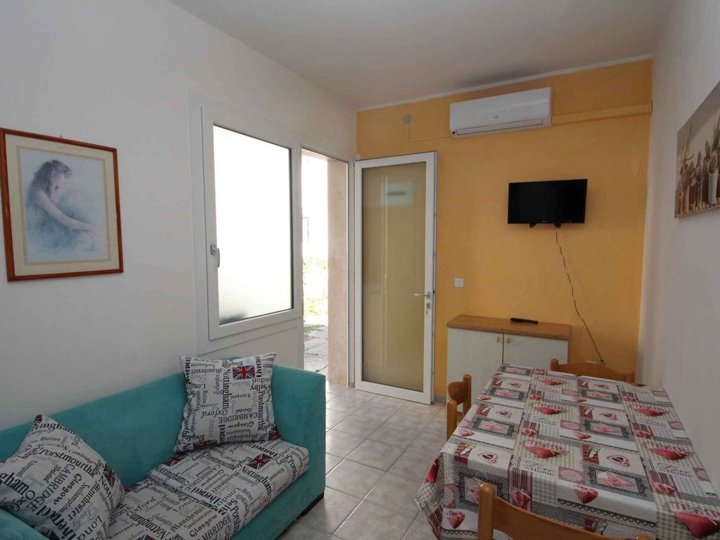Ferienwohnung mit Klimaanlage und Gemeinschaftsgarten