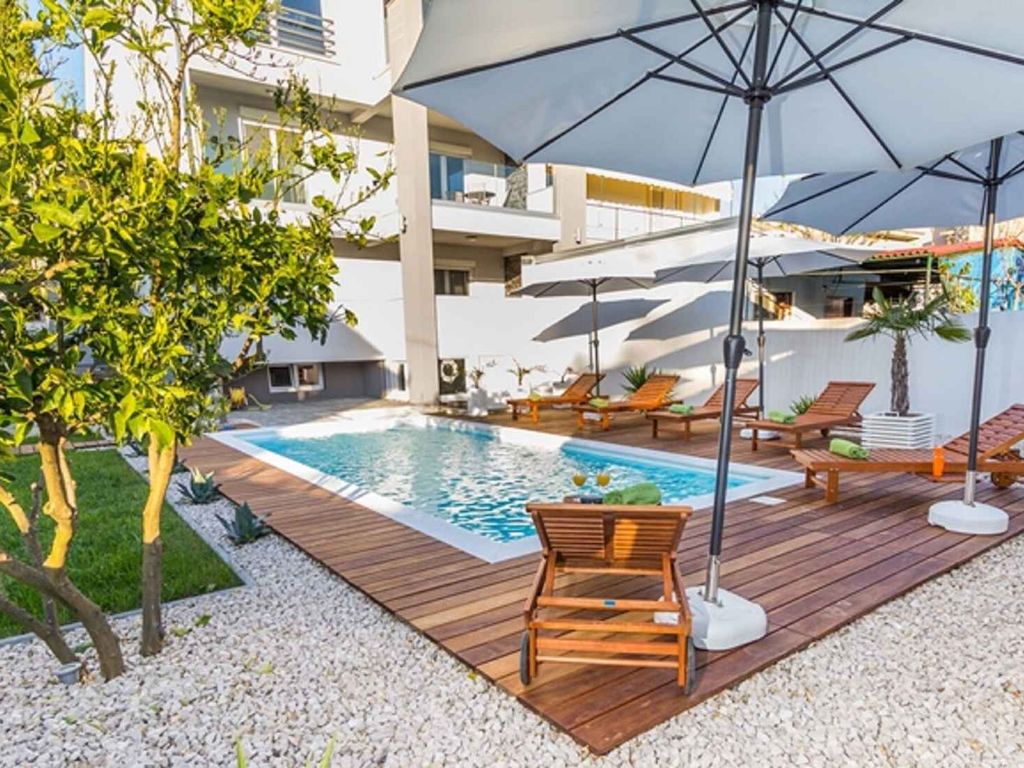 Ferienwohnung familienfreundlich mit Klimaanlage, Grillmöglichkeit, Pool und Parkplatz