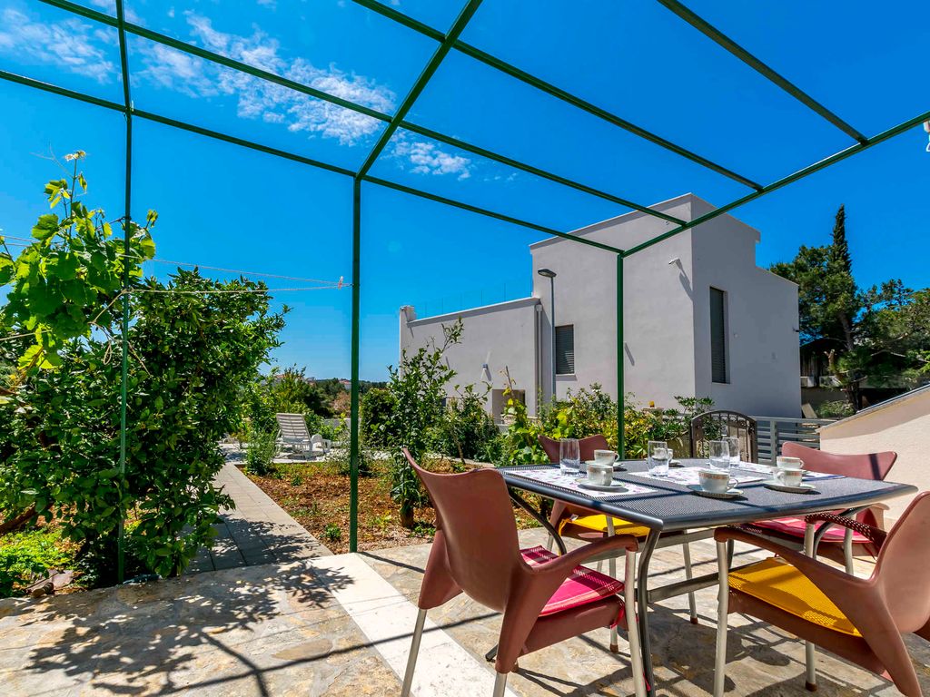 Ferienhaus Familienfreundlich mit Klimaanlage, Grillmöglichkeit und Internet