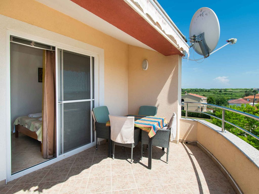 Ferienwohnung Familienfreundlich mit Klimaanlage, Grillmöglichkeit und Parkplatz