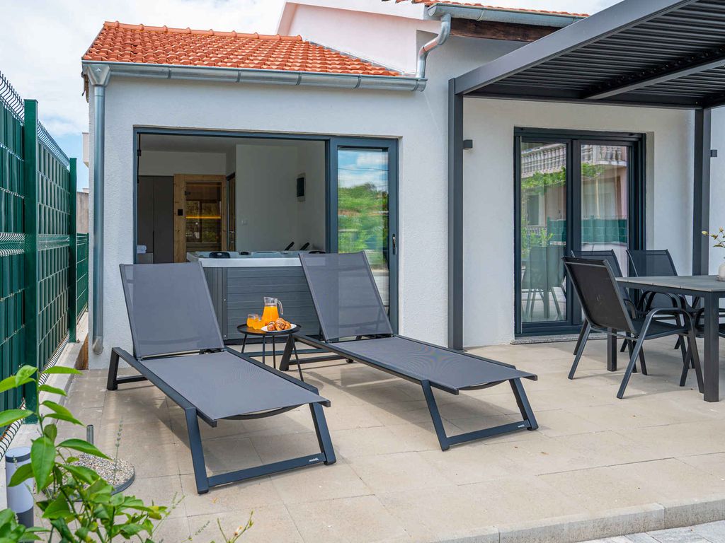 Ferienhaus mit Whirlpool, und Terrasse