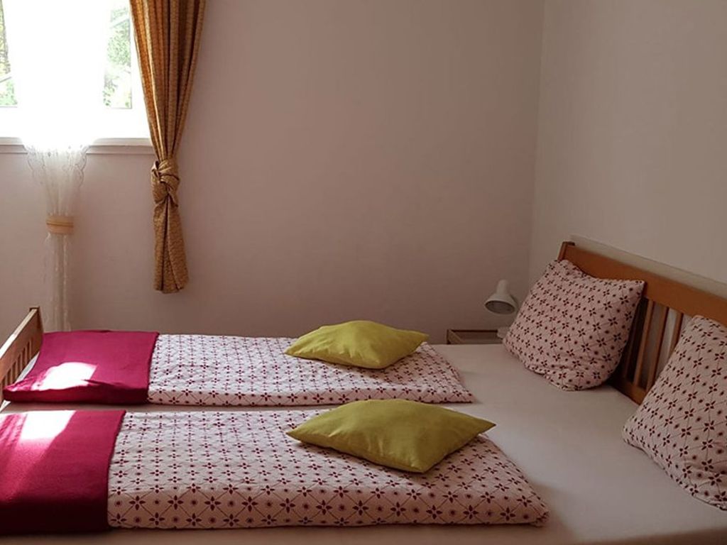 Ferienwohnung "Garten" mit Flussblick - Doppelbett