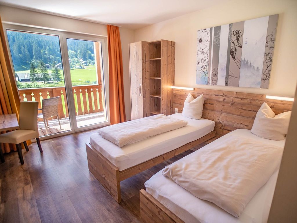 Standard Zimmer im COOEE alpin Hotel Dachstein