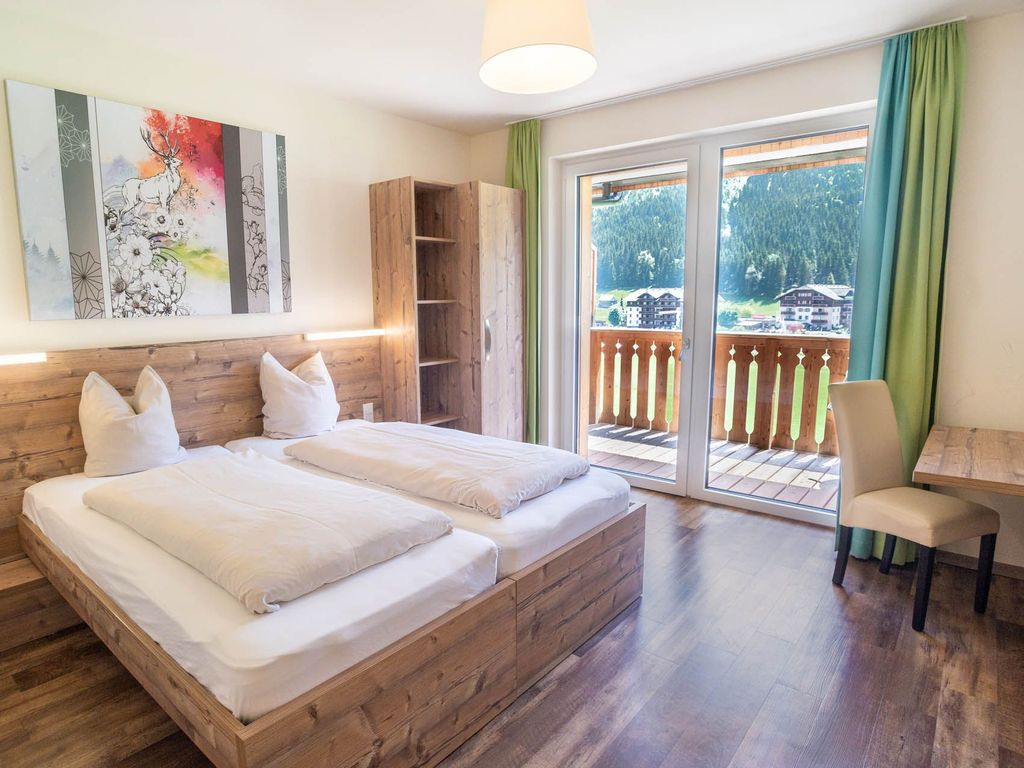Standard Zimmer barrierefrei im COOEE alpin Hotel Dachstein