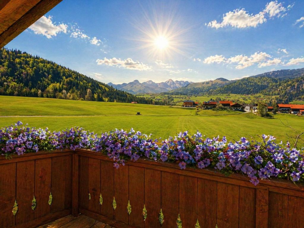 Der traumhafte Ausblick von den Ferienwohnungen im Gästehaus Schönfeld im Sommer...