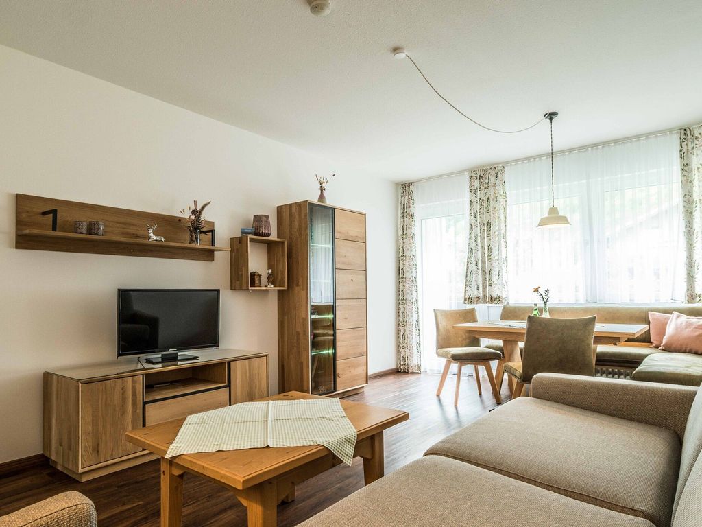 Der Wohn- und Essbereich in der Ferienwohnung D1