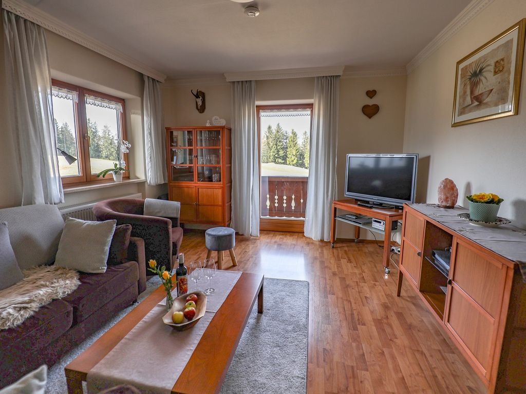 Wohnzimmer Ferienwohnung Gipfelzauber mit Zugang zum Sonnenbalkon