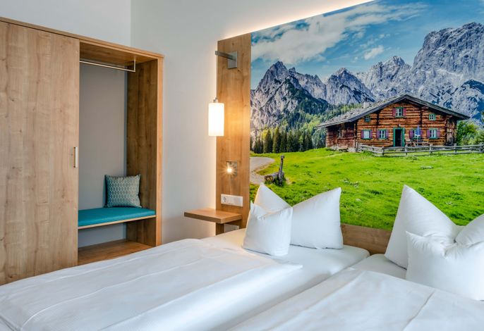 Juniorsuite Deluxe mit Balkon inkl. Schlafsofa mit Bad/WC, gemütliche Sitzecke
