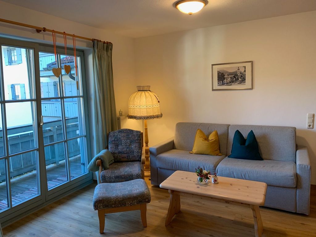 Wohnzimmer mit Schlafsofa