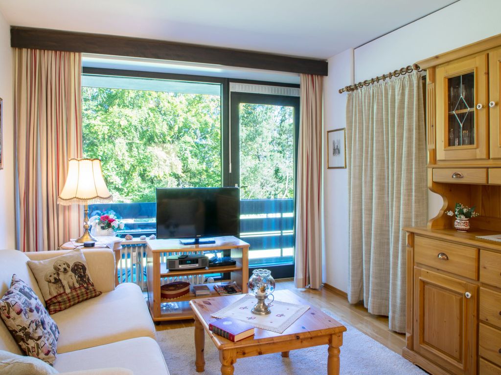 Wohnzimmer mit Balkon und Schlafcoach