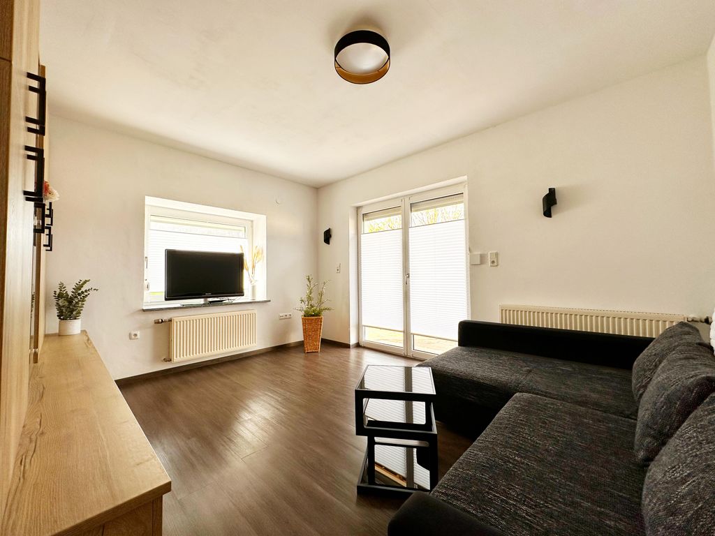 Wohnzimmer mit Schlafsofa
