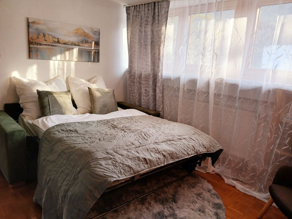 Wohnzimmer mit Schlafcouch