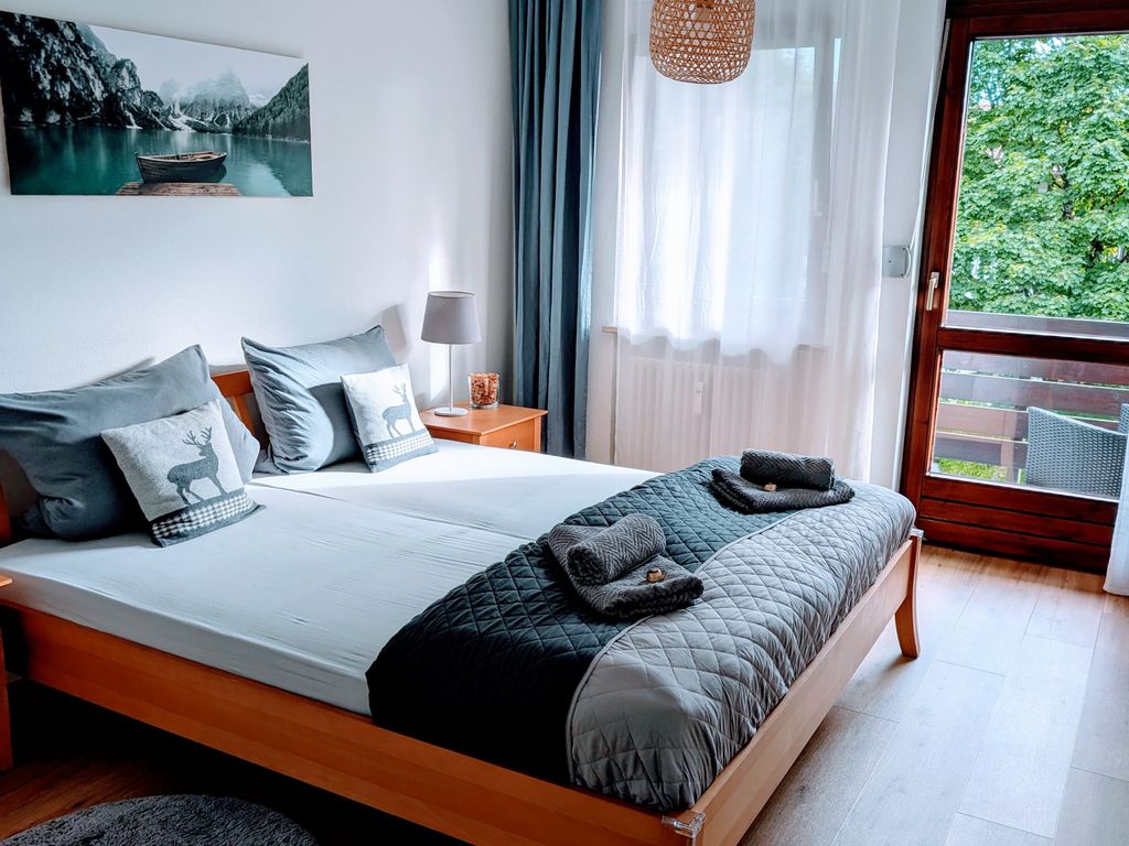 Schlafzimmer mit Balkon
