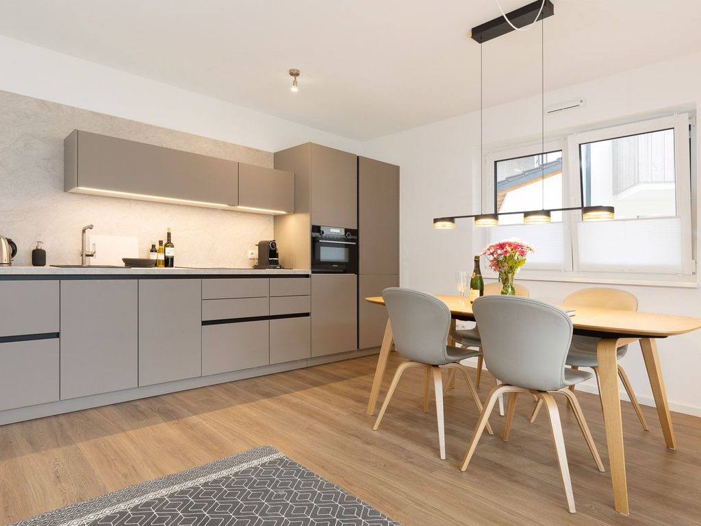 Wohnzimmer mit Küche