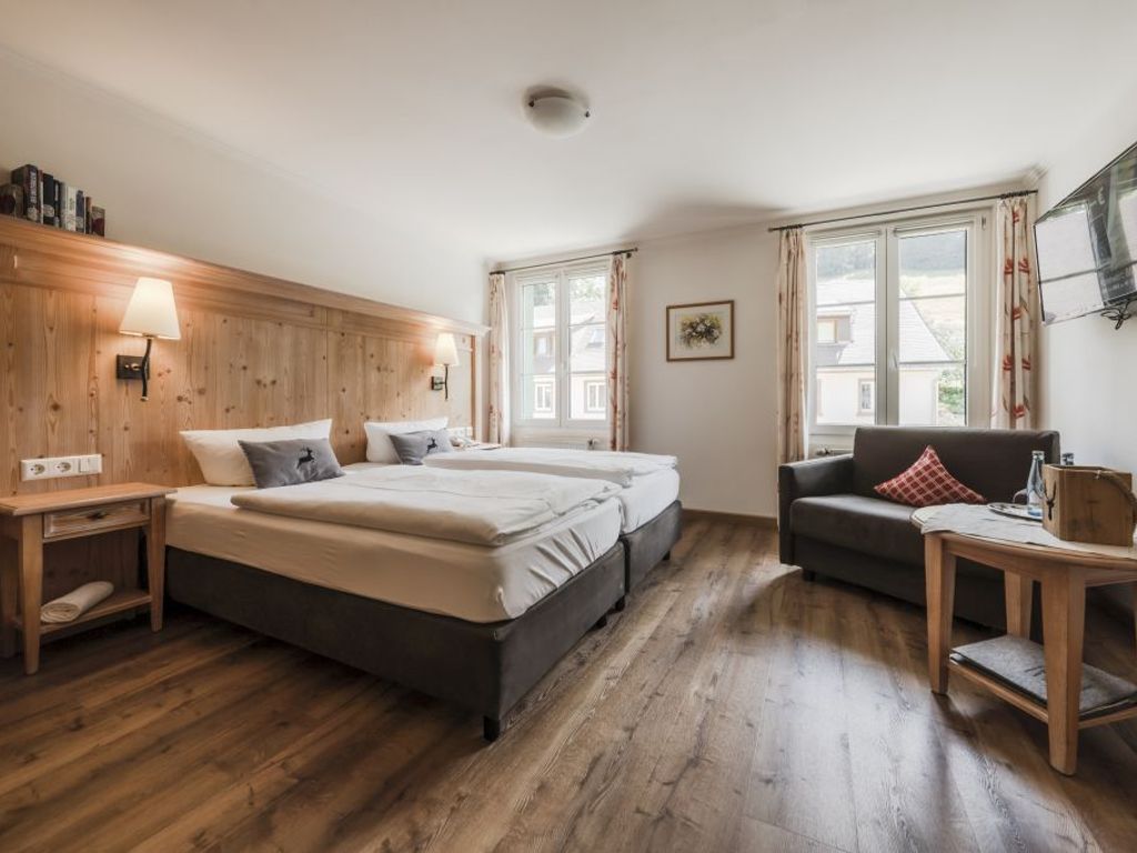 Doppelzimmer mit Holzboden
