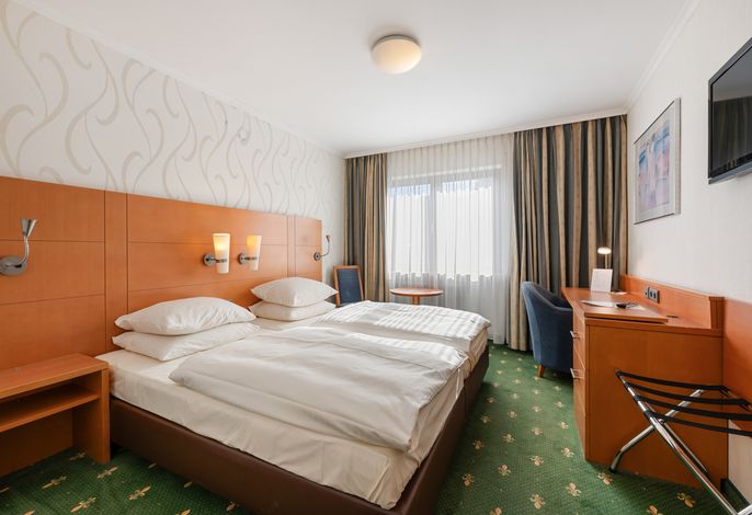 Doppelzimmer Standard Plus mit Dusche und WC