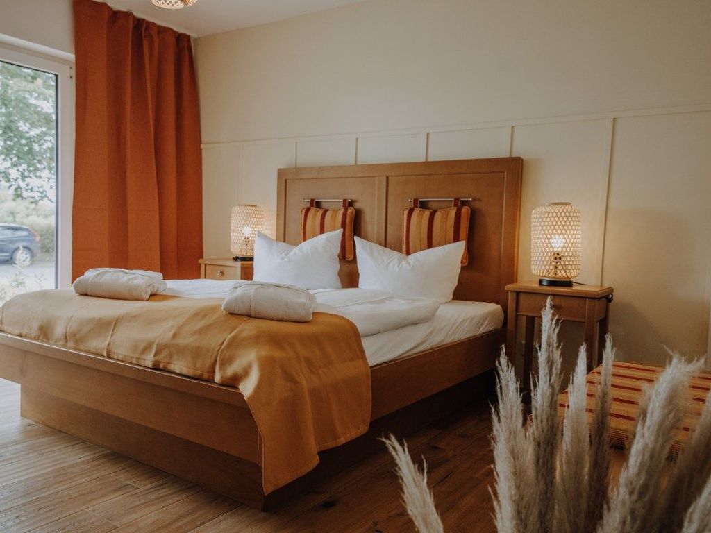 Unser Doppelzimmer Deluxe mit Treeneblick und Terrasse