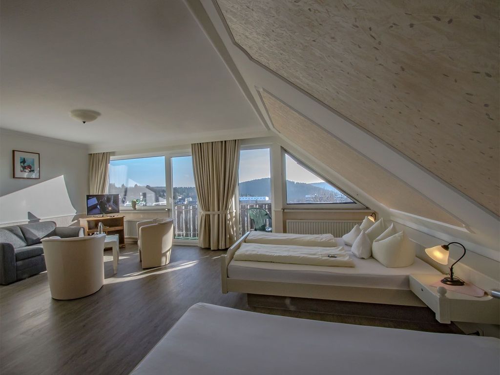 Dreibettzimmer mit Balkon