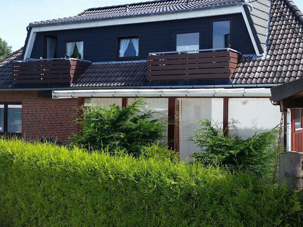 Haus Lily Balkon Süd/West und Wintergarten im EG mit Garten der zum EG gehört.