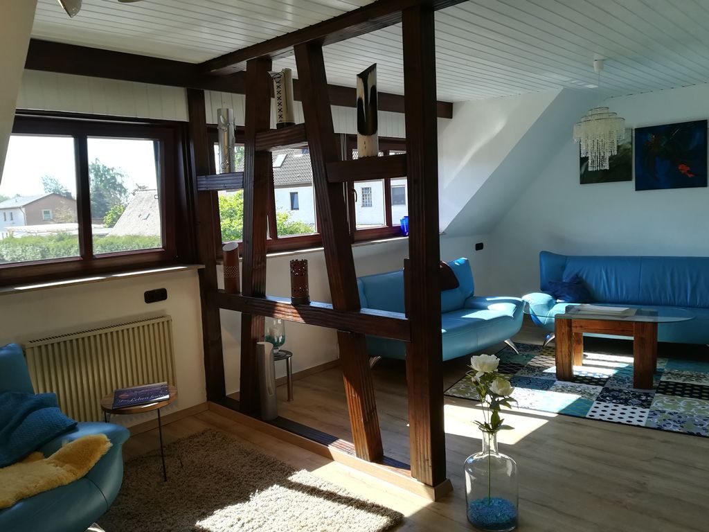 Wohnzimmer mit Fachwerk und Leder