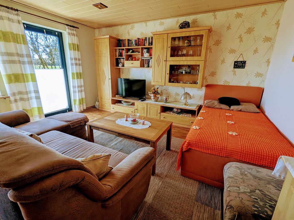 Wohnzimmer mit Zusatzbett