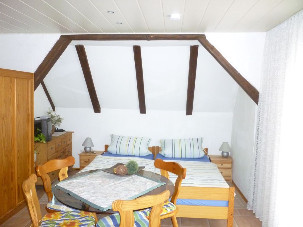 Mehrbettzimmer mit Balkon