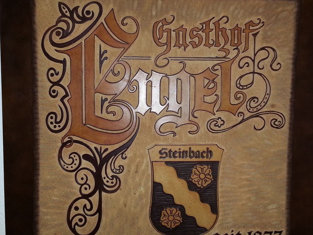 Gasthof Engel Steinbach - Logo auf Leder mit Ortswappen