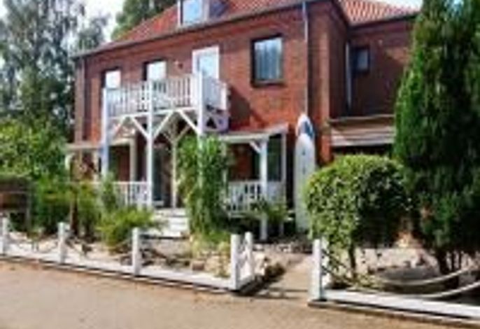 Photo Strandfeeling – Ferienwohnungen & Apartments 1
