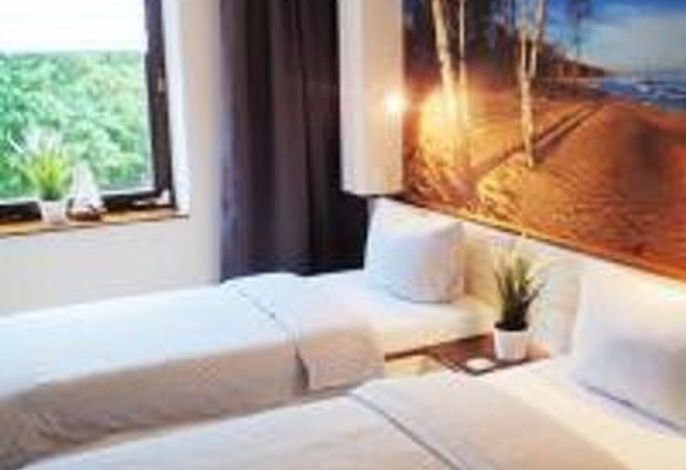 Photo Strandfeeling – Ferienwohnungen & Apartments 10