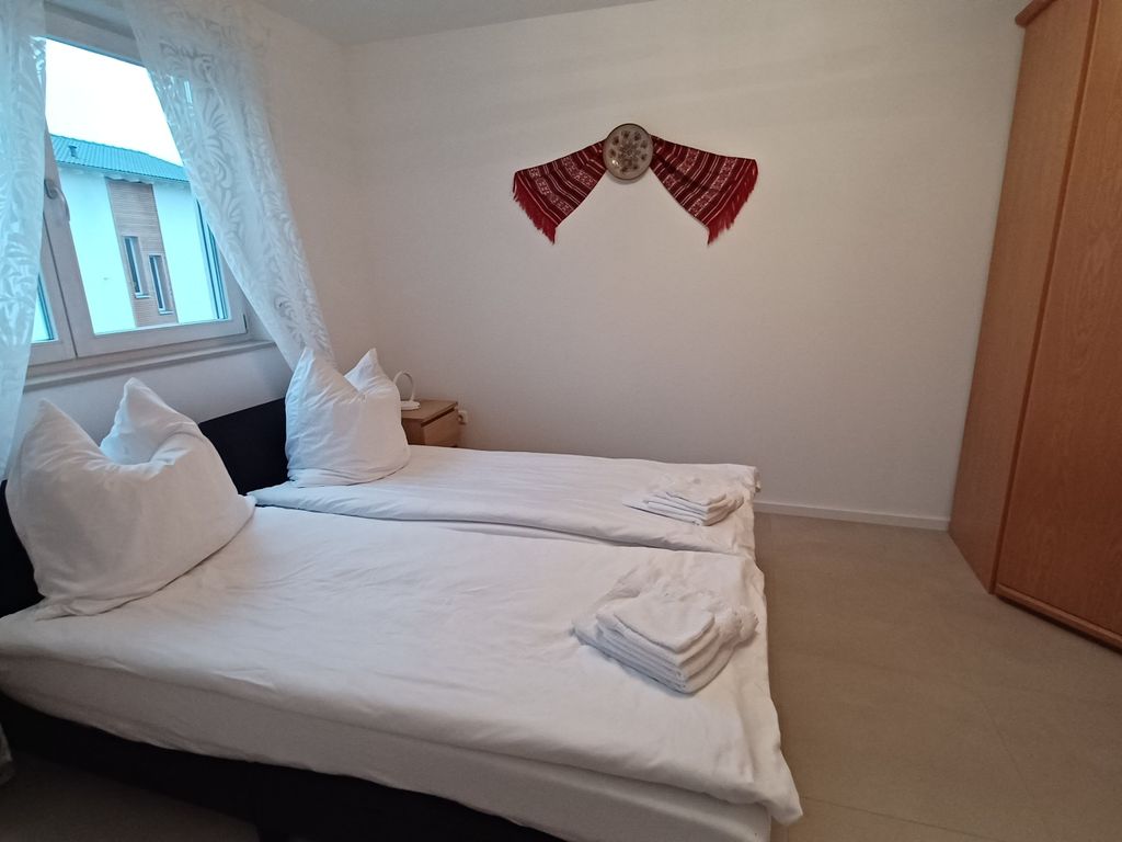 Schlafzimmer 3 mit zwei getrennten Betten